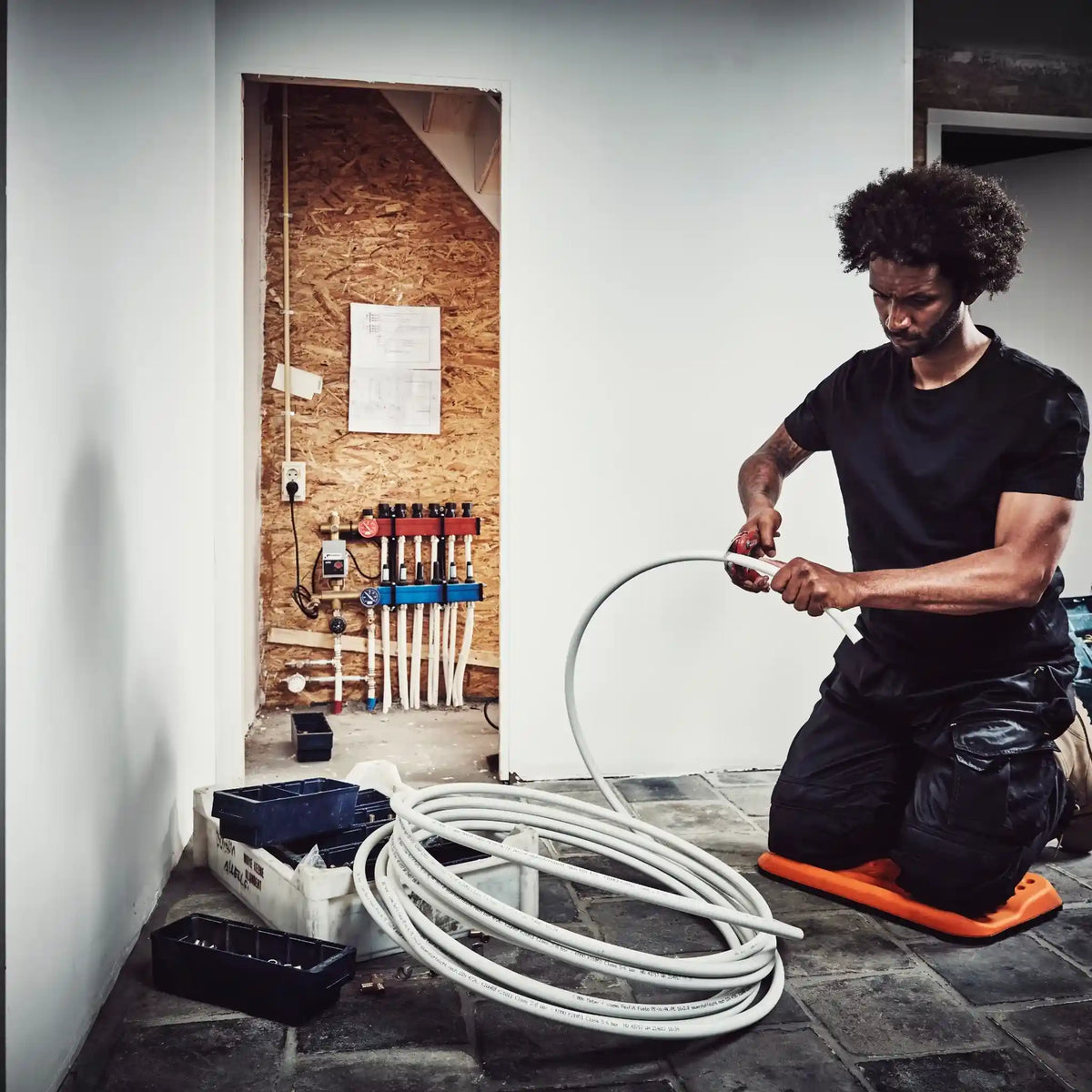 The FENTO Board in use during underfloor heating installation