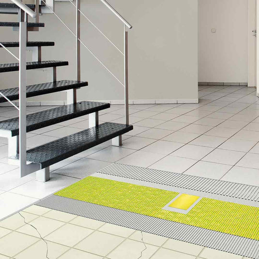 Tapis de désolidarisation Durabase CI++ jaune appliqué sous le carrelage