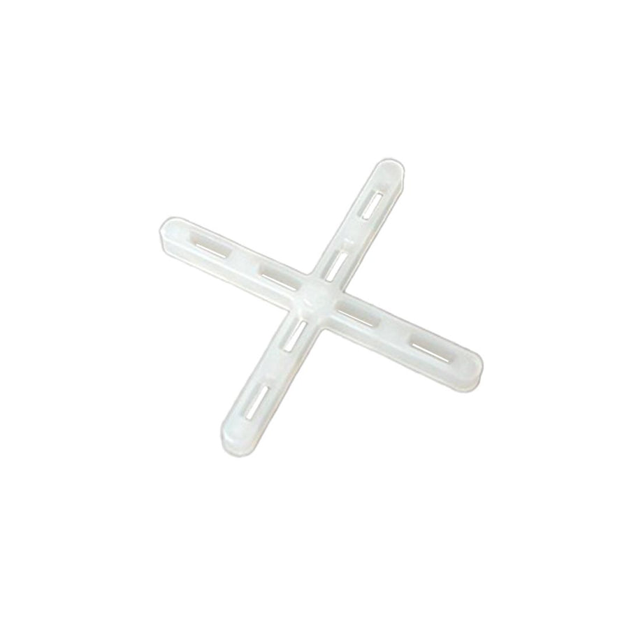 Detailansicht eines einzelnen, weißen Fugenkreuzes