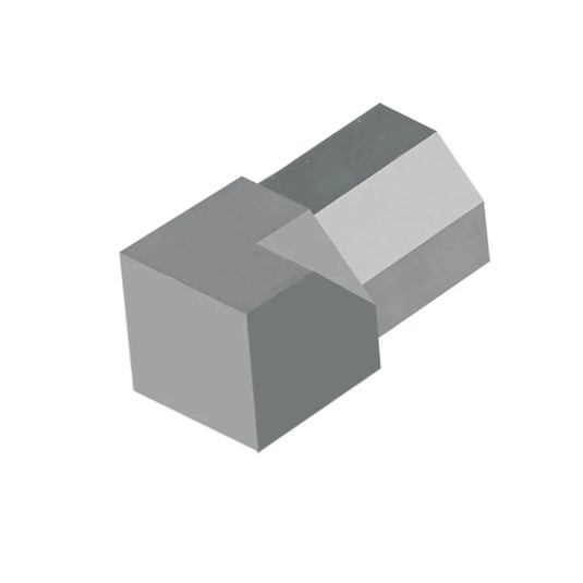 Nahaufnahme einer diamantförmigen DURAL Innenecke für das Diamantprofil Aluminium in betongrau.